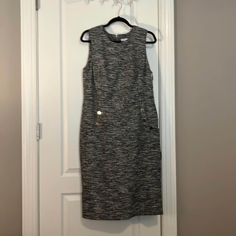 Calvin Klein size 14, black and white dress with gold accent.